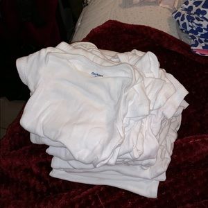 Set of 16 white onesies/